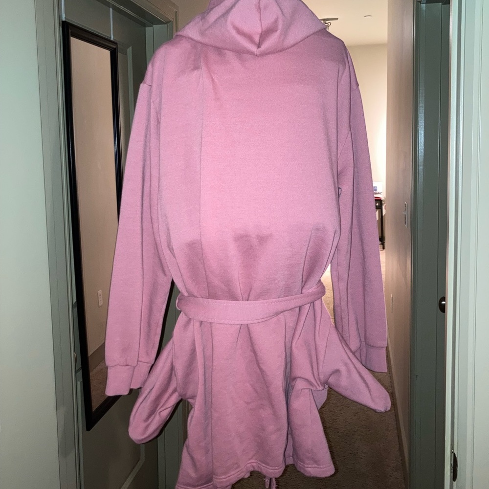 Pink Robe. Has pockets, Hood, cotton inside is fleece lined. Size L/XL